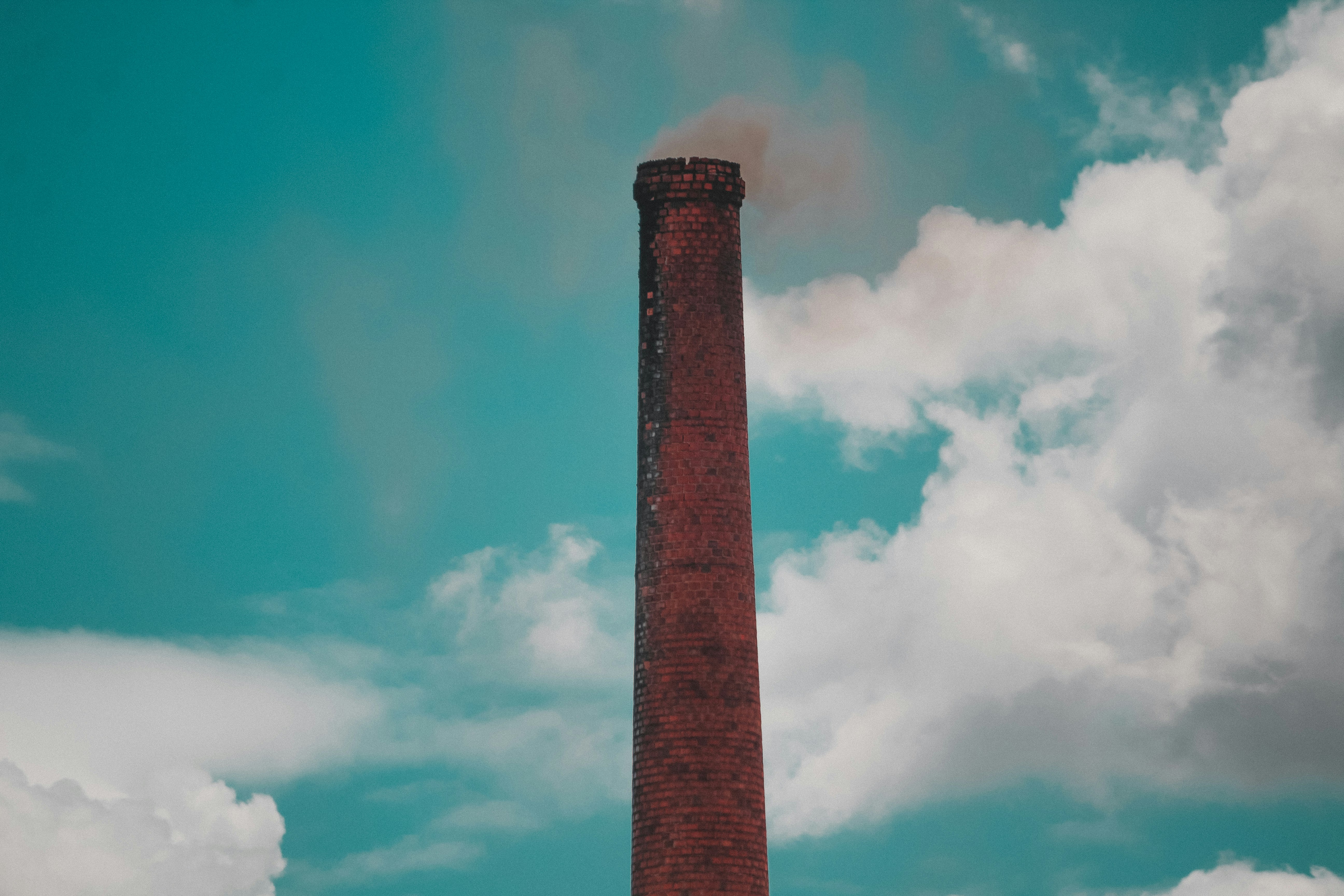 brown concrete tower under blue sky